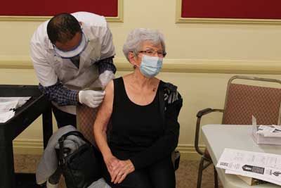 Lois Faulkner a Senior Choice at Home member receives Pfizers COVID-19 vaccine
