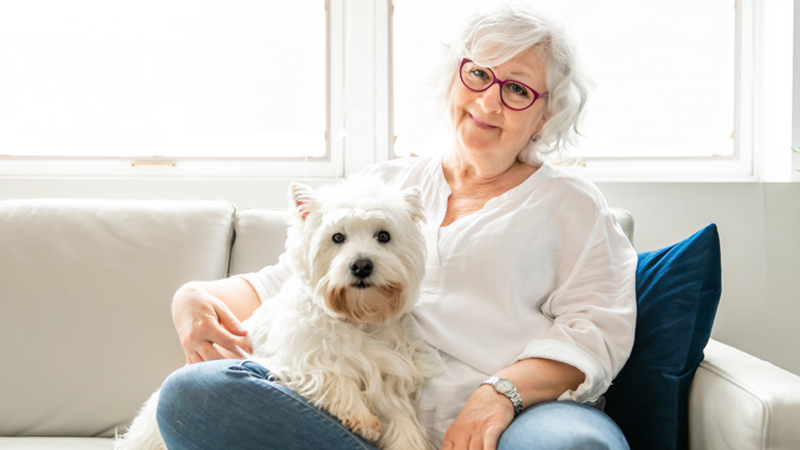 Elderly woman with her dog
